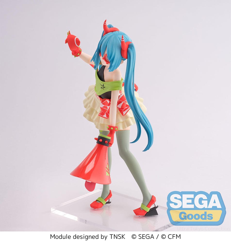 Hatsune Miku -Project DIVA- X FiGURiZM Hatsune Miku (DE:Monster T.R. Ver.) figure with blue hair and red demon horns, wearing a green and yellow dress with a monster theme, posed dynamically on a clear stand.