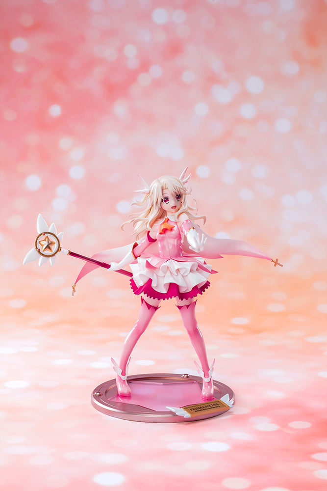 "Fate/kaleid liner Prisma Illya: Licht - The Nameless Girl Illyasviel von Einzbern (Anime 10th Anniversary Transformation Ver.) 1/7 Scale Figure - Detailed anime figure of Illya in her radiant transformation outfit with pink and white dress, flowing hair, and magical staff."