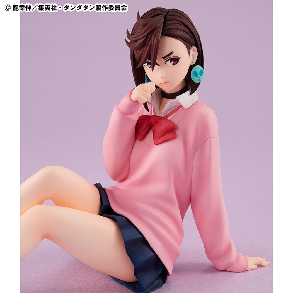 Dandadan G.E.M. Series Momo Ayase (Tenohira) figure in pink sweater and school uniform, sitting with a confident expression