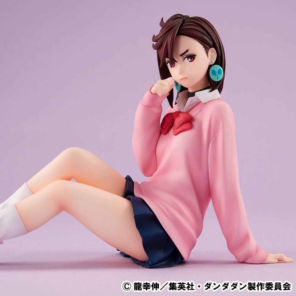 Dandadan G.E.M. Series Momo Ayase (Tenohira) figure in pink sweater and school uniform, sitting with a confident expression