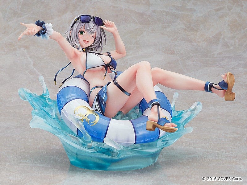 Hololive Production Shirogane Noel (Swimsuit Ver.) 1/7 Scale Figure lounging on float ring with water splash effects, in playful beach pose