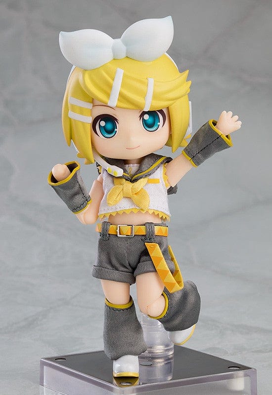 Vocaloid Nendoroid Doll Kagamine Rin (Reissue) featuring a posable body, yellow and gray outfit, white bow, and cheerful expression.