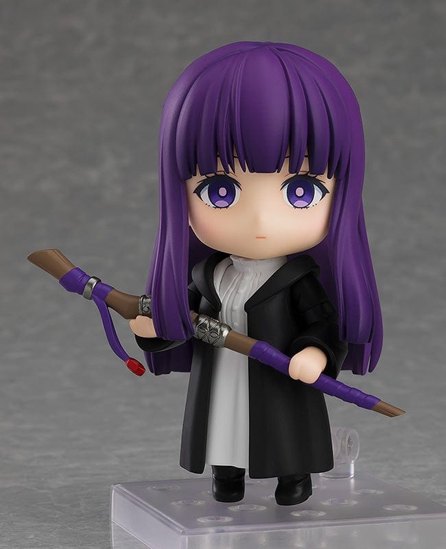 Frieren: Beyond Journey's End Nendoroid No.2368 Fern reissue figure featuring purple hair, black cloak, and iconic staff on a display base.