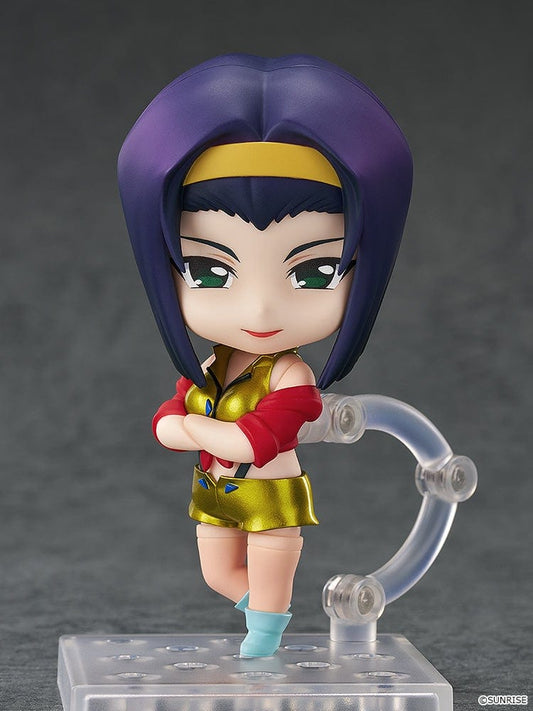 Faye Valentine Nendoroid from Cowboy Bebop in her yellow and red iconic outfit with a confident pose and green eyes.