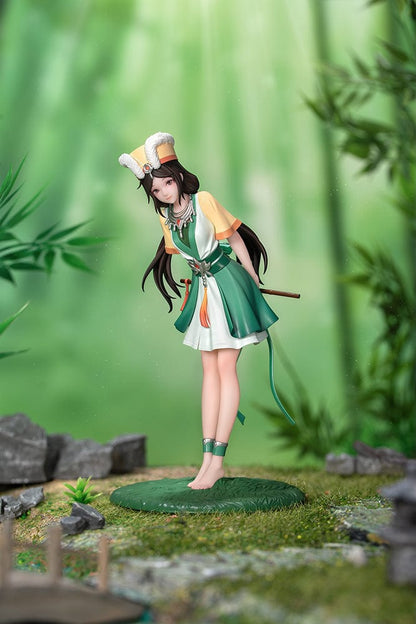 The Legend of Sword and Fairy Gift+ A'nu 1/10 Scale Figure with detailed traditional green and yellow outfit, bamboo flute, and grassy base.