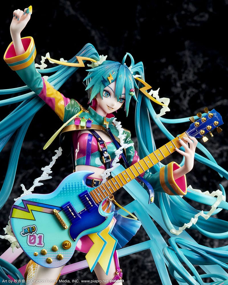 1/7 scale figure of Vocaloid Hatsune Miku from the "Hatsune Miku Japan Tour 2023 -Thunderbolt-" series. She's featured with an electric guitar, sporting her trademark blue hair in a dynamic, swirling design that mimics the motion of a thunderstorm. The figure is adorned in a colorful, tour-inspired costume with sharp geometric patterns and lightning motifs, posed atop a base that echoes the theme with angular lines and electric designs.