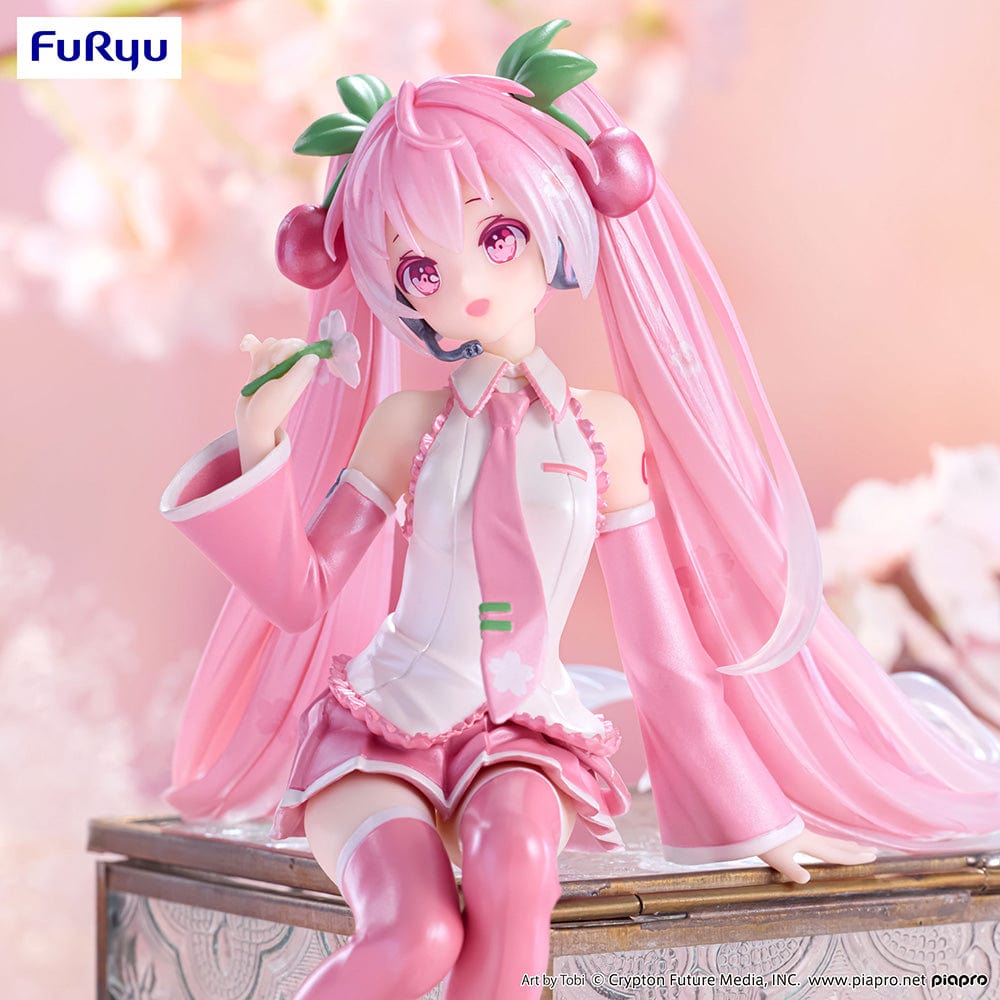 Vocaloid Sakura Miku (2024 Pearl Color Ver.) Noodle Stopper Figure with a pink and white cherry blossom-themed design, seated gracefully with a beautiful pearl finish.