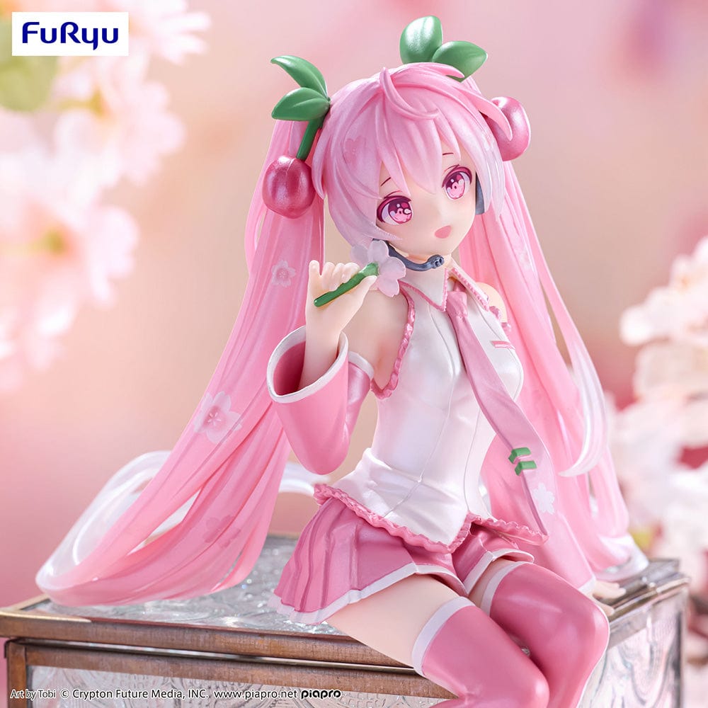 Vocaloid Sakura Miku (2024 Pearl Color Ver.) Noodle Stopper Figure with a pink and white cherry blossom-themed design, seated gracefully with a beautiful pearl finish.