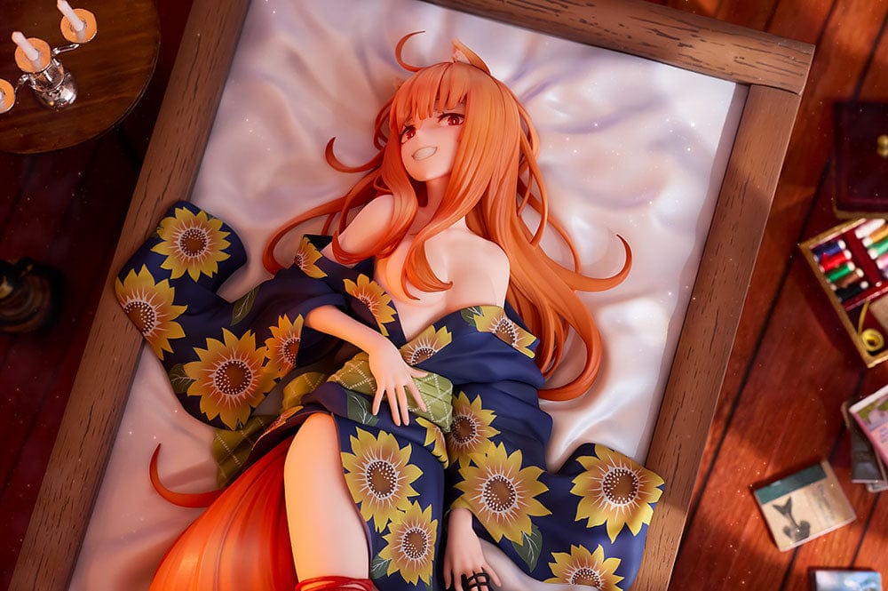 Spice and Wolf KD Colle Holo (Yukata Beauty Ver.) 1/7 Scale Figure reclining in a sunflower-patterned yukata with flowing orange hair.