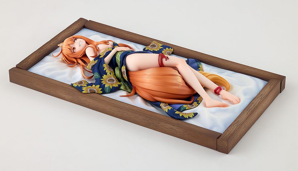 Spice and Wolf KD Colle Holo (Yukata Beauty Ver.) 1/7 Scale Figure reclining in a sunflower-patterned yukata with flowing orange hair.