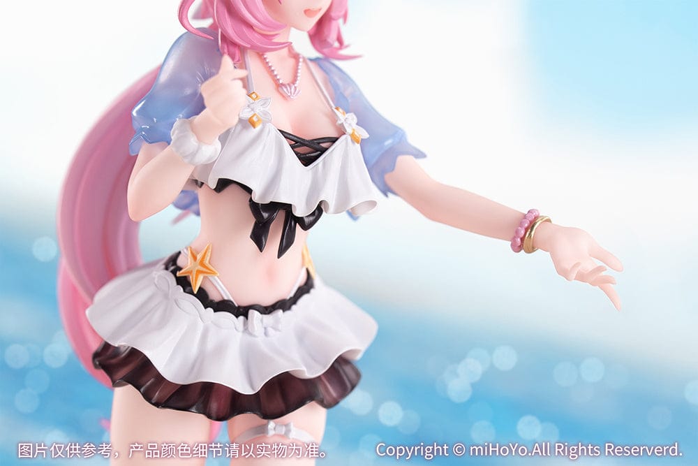 Honkai Impact 3rd Gift+ Elysia (Summer Miss Elf Ver.) 1/8 Scale Figure in beach outfit with pink hair, standing on a sandy base.