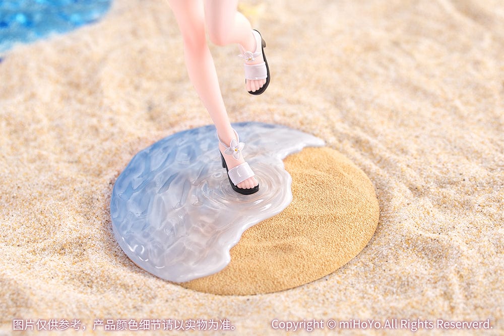 Honkai Impact 3rd Gift+ Elysia (Summer Miss Elf Ver.) 1/8 Scale Figure in beach outfit with pink hair, standing on a sandy base.