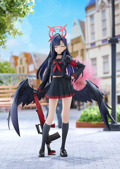 Blue Archive Ichika 1/7 scale figure in a dark school uniform with black wings, holding a red weapon and wearing a symbolic red halo-like accessory, with a calm, closed-eyed expression.