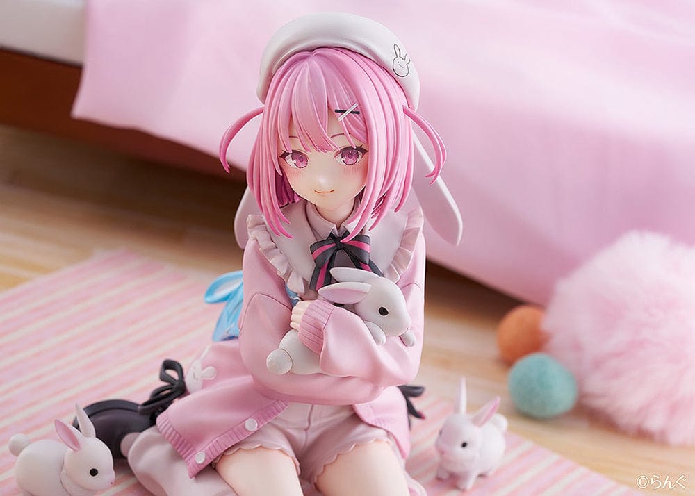 Illustrator Collection Figure Toshishita Kanojo 1/6 Scale Figure, featuring a pink-haired girl in pastel clothing surrounded by small rabbits on a circular base.