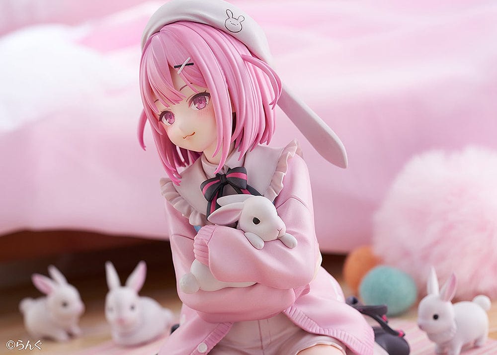 Illustrator Collection Figure Toshishita Kanojo 1/6 Scale Figure, featuring a pink-haired girl in pastel clothing surrounded by small rabbits on a circular base.