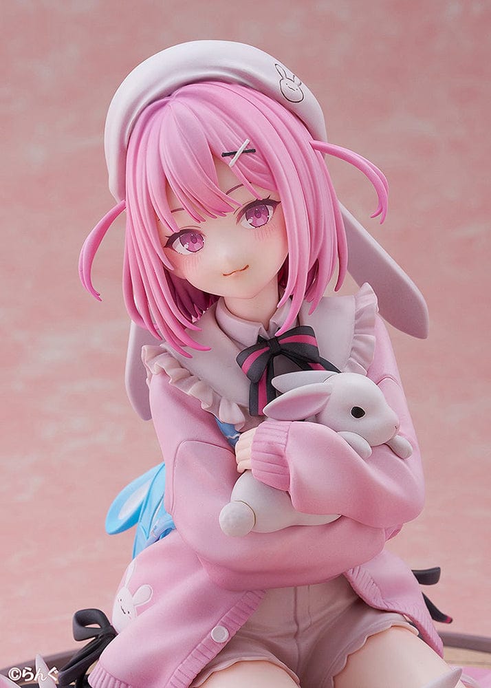 Illustrator Collection Figure Toshishita Kanojo 1/6 Scale Figure, featuring a pink-haired girl in pastel clothing surrounded by small rabbits on a circular base.