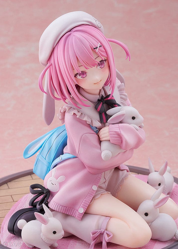 Illustrator Collection Figure Toshishita Kanojo 1/6 Scale Figure, featuring a pink-haired girl in pastel clothing surrounded by small rabbits on a circular base.