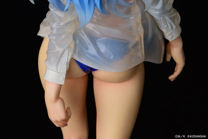The figure depicts a character with blue hair and a blue swimsuit, complemented by a translucent white shirt, standing on a base adorned with crystal-like decorations.
