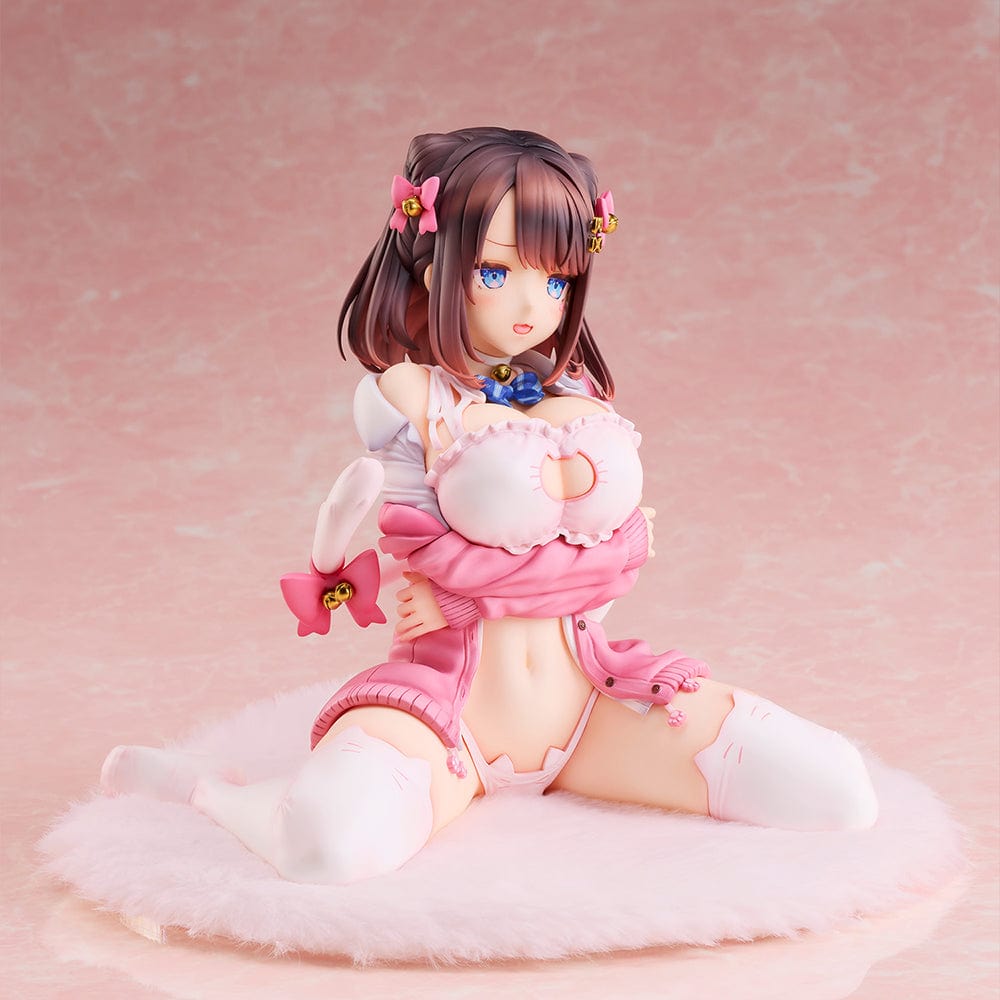 KATTO Illustration Ribbon Hairpin-chan Figure featuring a seated figure in a pink outfit with hair ribbons and bell charms, posed on a soft mat.