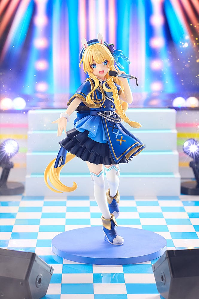 KonoSuba KD Colle Iris (Light Novel Idol Ver.) figure in blue idol outfit with braided blonde hair, bunny ears, and holding a microphone.