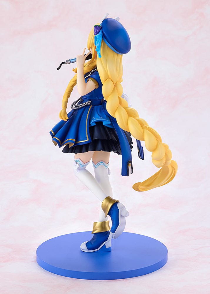 KonoSuba KD Colle Iris (Light Novel Idol Ver.) figure in blue idol outfit with braided blonde hair, bunny ears, and holding a microphone.