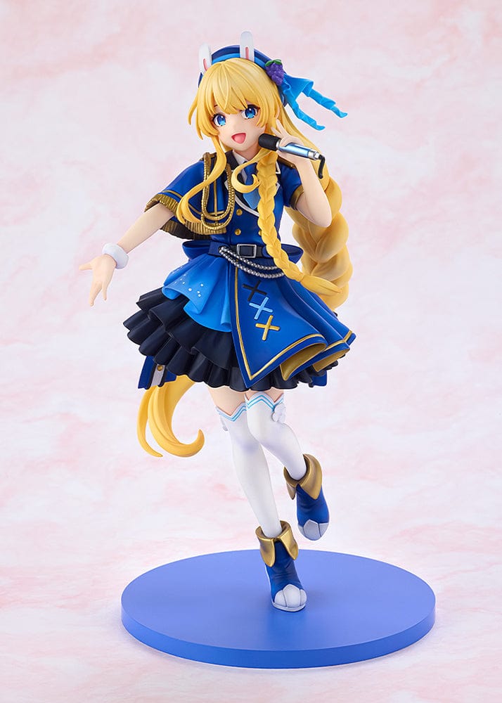 KonoSuba KD Colle Iris (Light Novel Idol Ver.) figure in blue idol outfit with braided blonde hair, bunny ears, and holding a microphone.