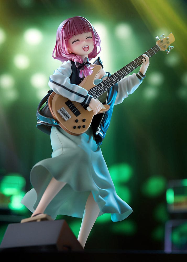 Bocchi the Rock! DreamTech Kikuri Hiroi 1/7 Scale Figure holding bass guitar in performance pose on checkered base.