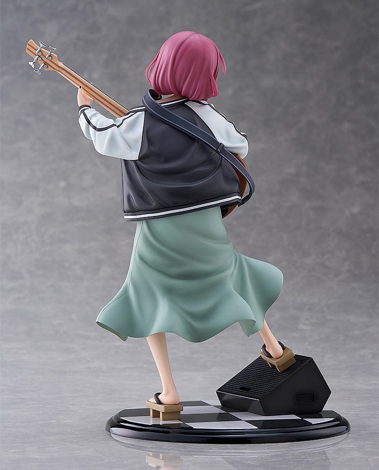 Bocchi the Rock! DreamTech Kikuri Hiroi 1/7 Scale Figure holding bass guitar in performance pose on checkered base.