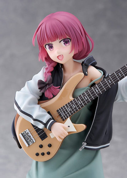 Bocchi the Rock! DreamTech Kikuri Hiroi 1/7 Scale Figure holding bass guitar in performance pose on checkered base.