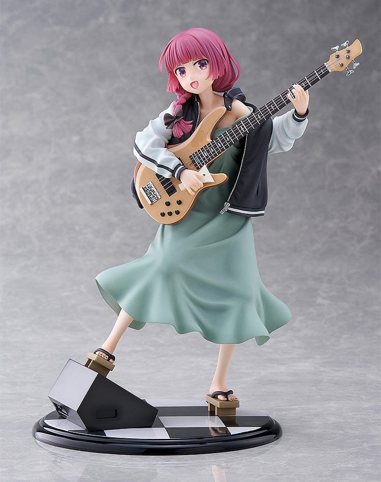 Bocchi the Rock! DreamTech Kikuri Hiroi 1/7 Scale Figure holding bass guitar in performance pose on checkered base.