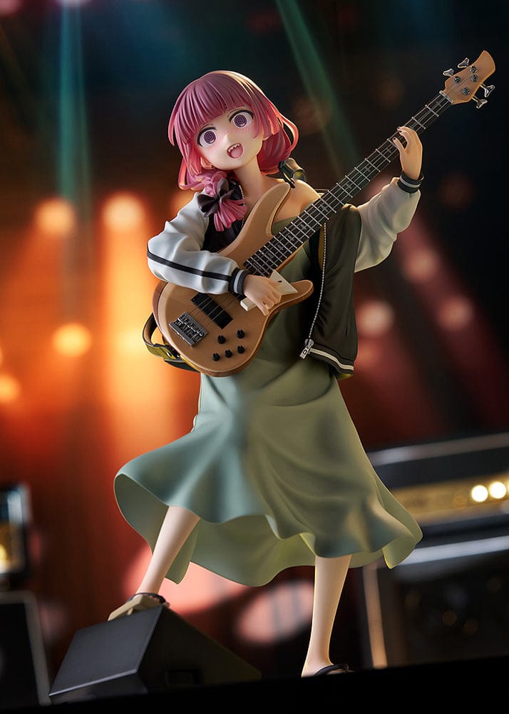 Bocchi the Rock! DreamTech Kikuri Hiroi 1/7 Scale Figure holding bass guitar in performance pose on checkered base.