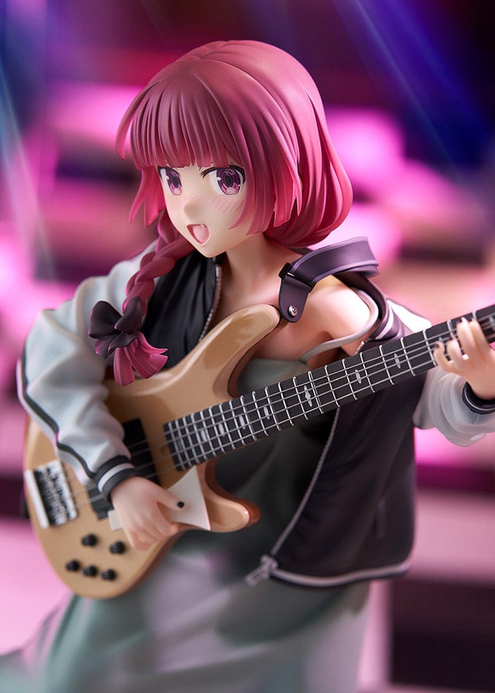 Bocchi the Rock! DreamTech Kikuri Hiroi 1/7 Scale Figure holding bass guitar in performance pose on checkered base.