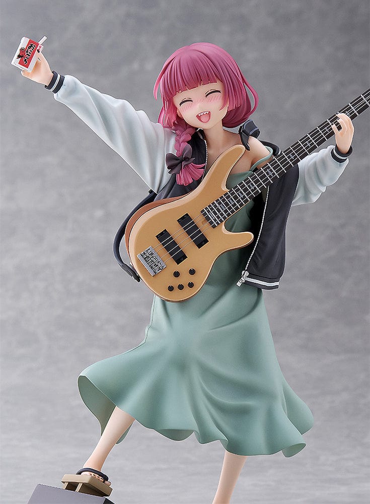 Bocchi the Rock! DreamTech Kikuri Hiroi 1/7 Scale Figure holding bass guitar in performance pose on checkered base.