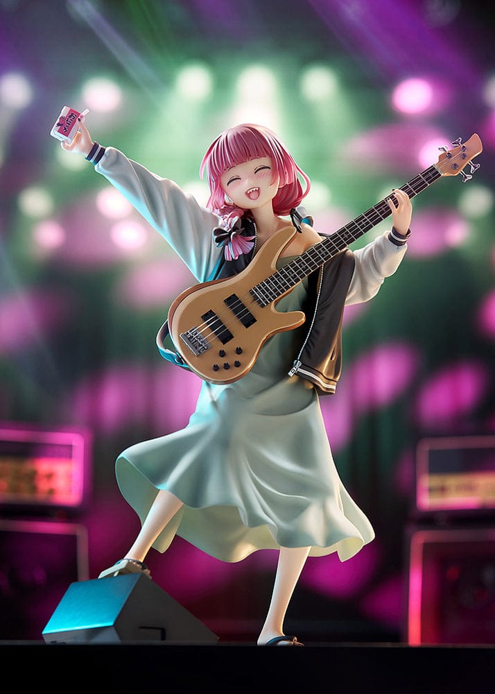 Bocchi the Rock! DreamTech Kikuri Hiroi 1/7 Scale Figure holding bass guitar in performance pose on checkered base.