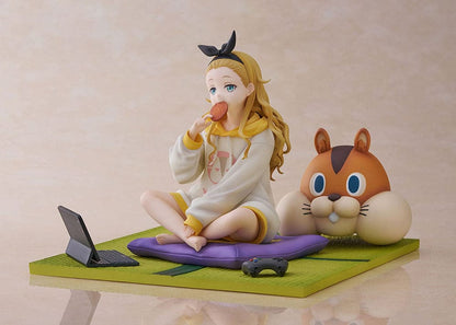 A 1/7 scale figure of Kurumi from the hit anime Lycoris Recoil, dressed in a yellow hoodie, enjoying a snack while sitting cross-legged on a green mat next to a large plush squirrel and a small gaming console.