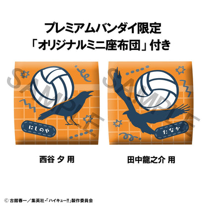 Haikyuu!! Look Up Series figures of Yu Nishinoya in orange and Ryunosuke Tanaka in black Karasuno High uniforms, sitting and looking up, held in human hands, with expressive features and volleyball-themed design.