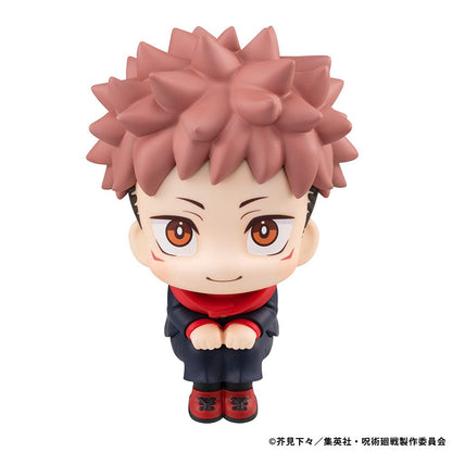 Lookup Figure Jujutsu Kaisen Yuji Itadori seated in chibi form, with spiky hair and bright smile, wearing black and red uniform.