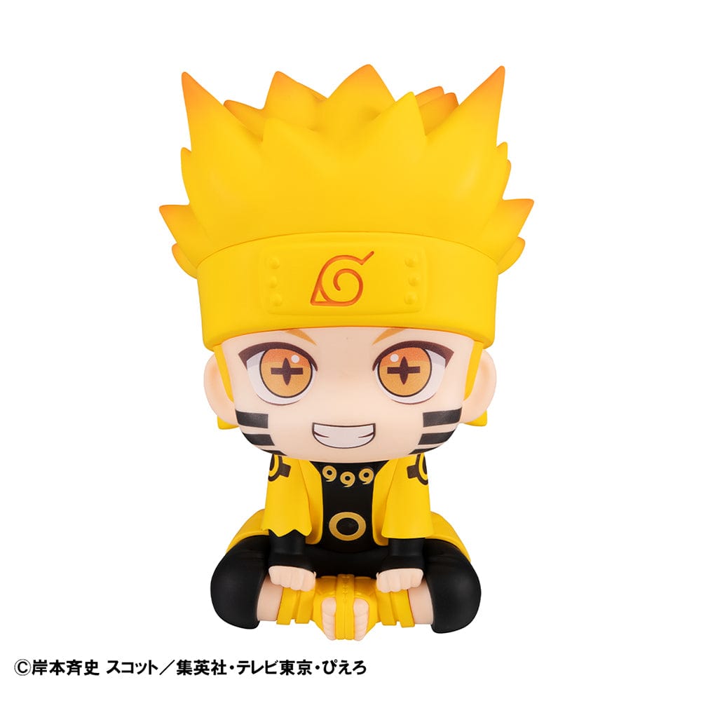 Naruto: Shippuden Look Up Series Naruto Uzumaki Six Paths Sage Mode Figure, featuring Naruto in golden Sage cloak with seated chibi pose, set against a rustic natural background.