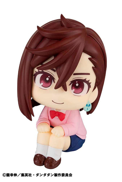 Dandadan Look Up Series Momo Figure, featuring chibi-style design with side-swept hair, pink sweater, schoolgirl outfit, and upward gaze.