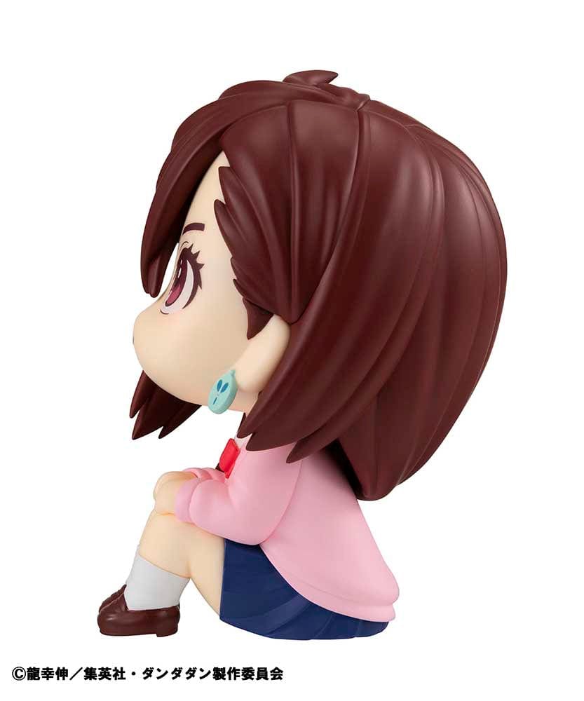 Dandadan Look Up Series Momo Figure, featuring chibi-style design with side-swept hair, pink sweater, schoolgirl outfit, and upward gaze.