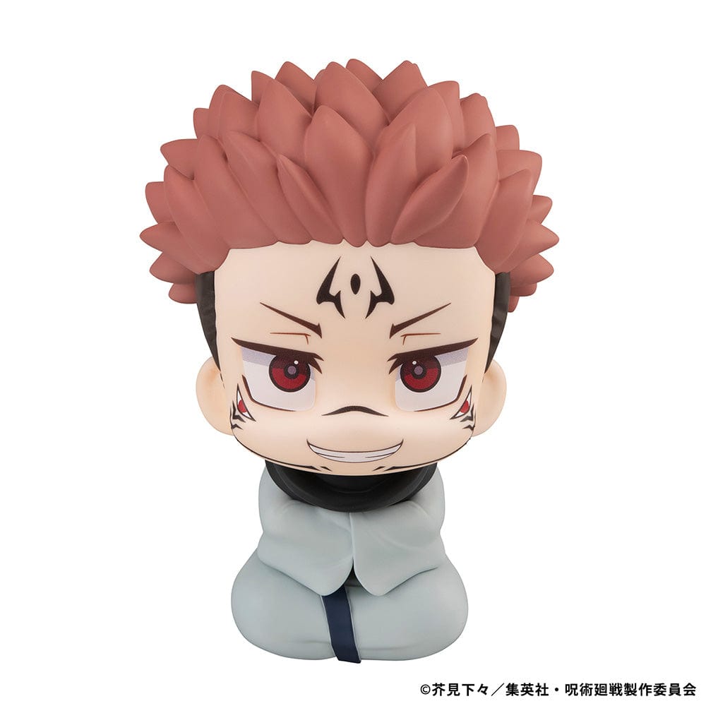 Lookup Figure Jujutsu Kaisen Sukuna in seated chibi form with signature face markings and red eyes, smiling mischievously.