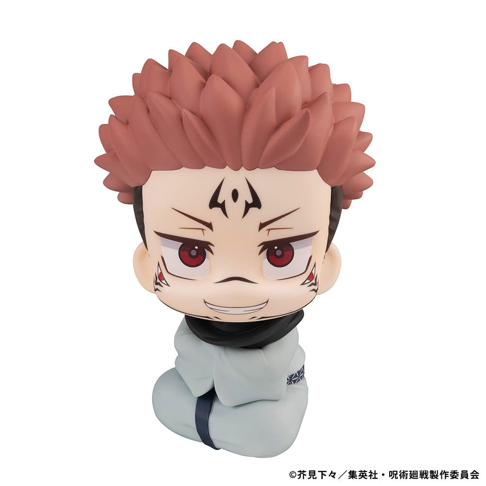 Lookup Figure Jujutsu Kaisen Sukuna in seated chibi form with signature face markings and red eyes, smiling mischievously.