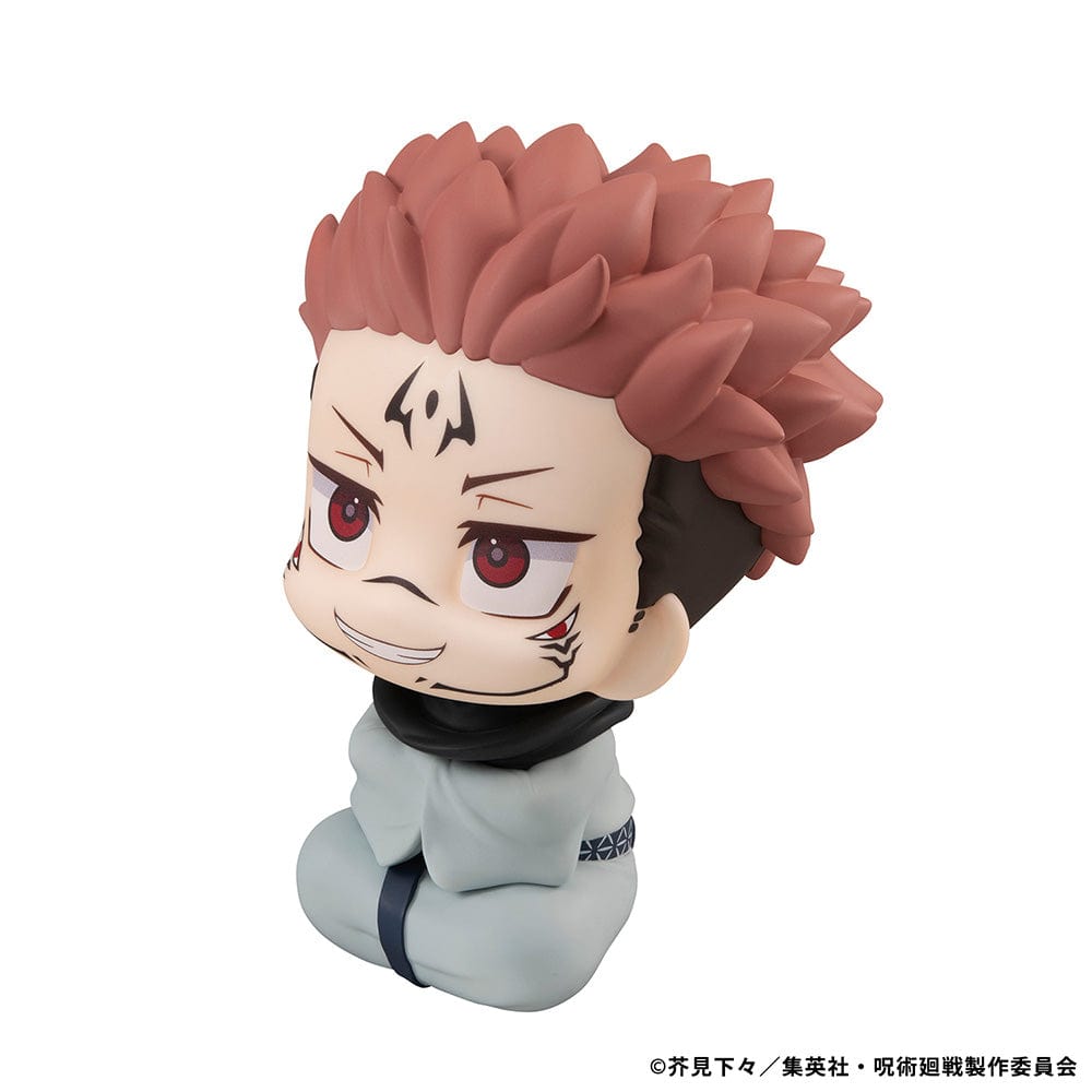 Lookup Figure Jujutsu Kaisen Sukuna in seated chibi form with signature face markings and red eyes, smiling mischievously.