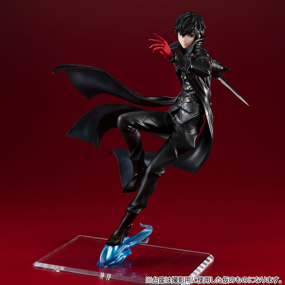 Persona 5 Royal Lucrea Joker (Showtime Edition) figure, featuring Joker in a dynamic pose with a dagger, wearing a black trench coat and mask, on a unique translucent blue base.