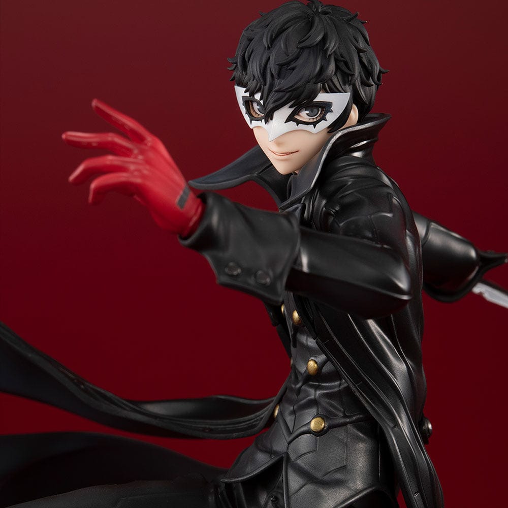 Persona 5 Royal Lucrea Joker (Showtime Edition) figure, featuring Joker in a dynamic pose with a dagger, wearing a black trench coat and mask, on a unique translucent blue base.