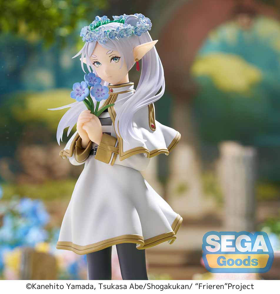 Frieren: Beyond Journey's End Luminasta Frieren (Flower Garden) Figure featuring Frieren in a white and gold-trimmed dress, holding a bouquet of flowers, with a floral crown and hexagonal grass base, set against a white background.