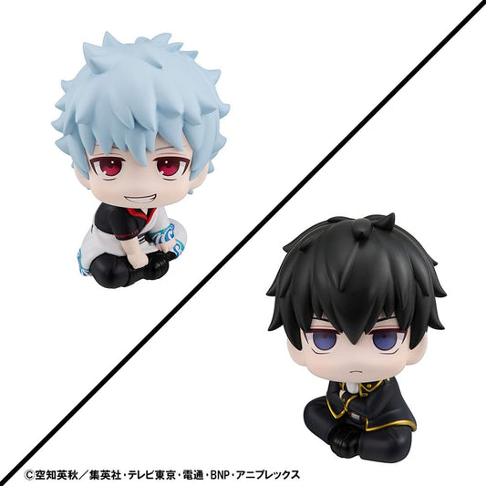 Look Up series figure set of Gintoki Sakata and Toshiro Hijikata from Gintama, both in their signature outfits and sitting positions, looking upwards with a mix of laid-back and stern expressions, accompanied by an exclusive gift.