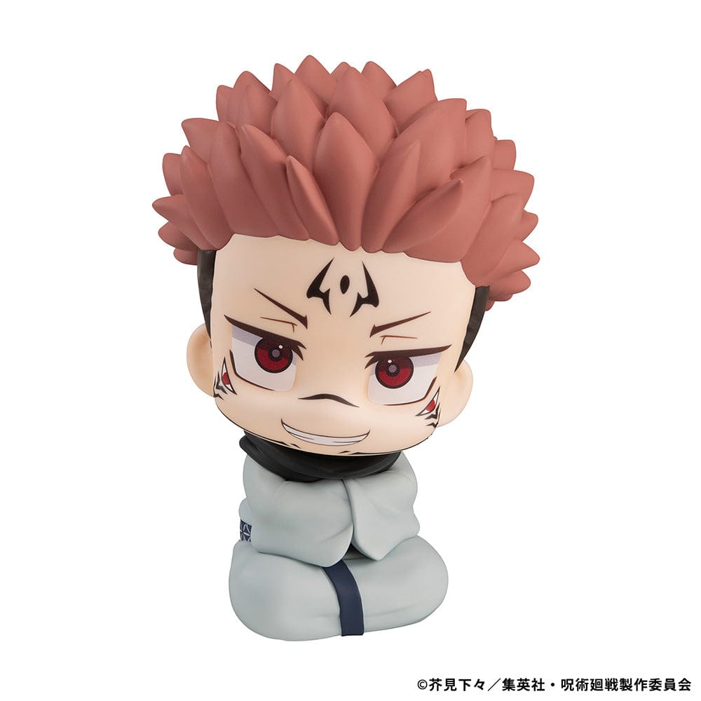 Lookup Figure Jujutsu Kaisen Sukuna in seated chibi form with signature face markings and red eyes, smiling mischievously.