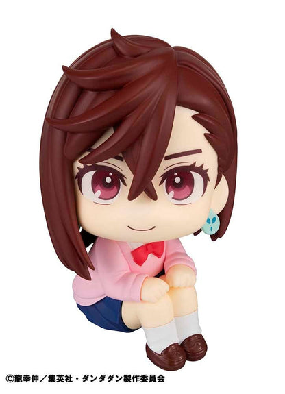 Dandadan Look Up Series Momo Figure, featuring chibi-style design with side-swept hair, pink sweater, schoolgirl outfit, and upward gaze.