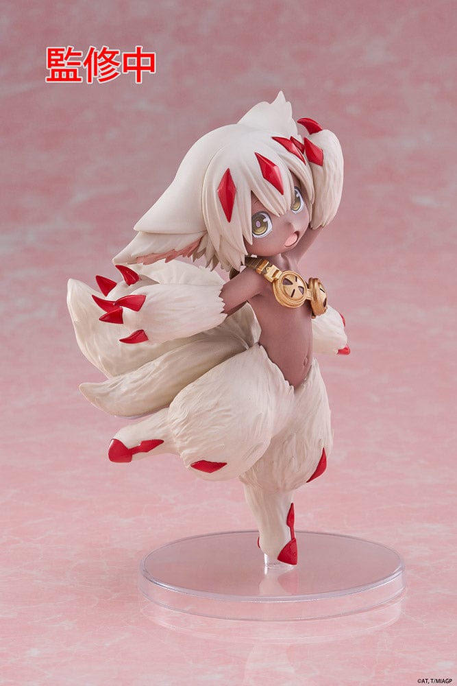 Made in Abyss Faputa Coreful Figure showcasing a dynamic pose with white fur, red markings, golden collar, and playful expression against a pink background.